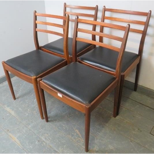 725 - A set of four mid-century teak dining chairs by Victor Wilkins for G-Plan, with slatted backs and dr... 