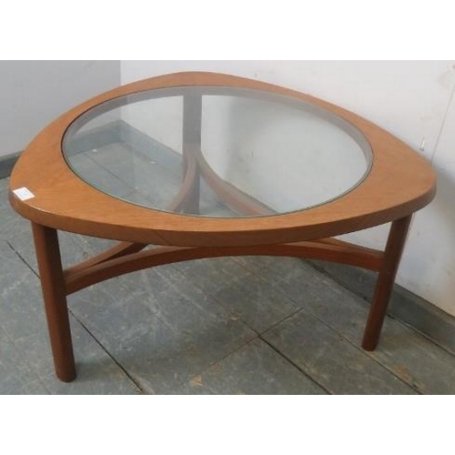 733 - A mid-century teak ‘astro’ coffee table by Nathan, with glass insert, on turned supports with curved... 