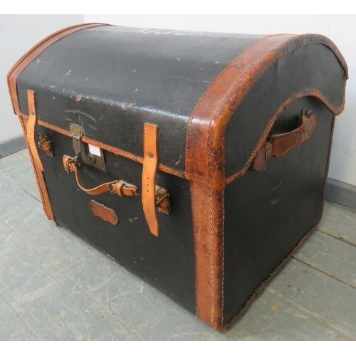 738 - An antique leather-bound travelling trunk by Mason & Whitehead of Brompton Rd, London with stencille... 