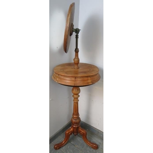 740 - A Victorian walnut Gentleman’s shaving stand, having a circular height-adjustable mirror above two l... 