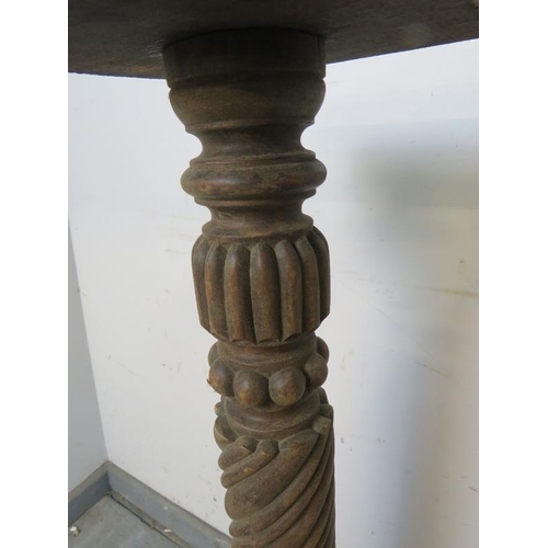 749 - A pair of antique mahogany plant stands, with fluted and spiral carved columns, on plinth bases. 
H9... 