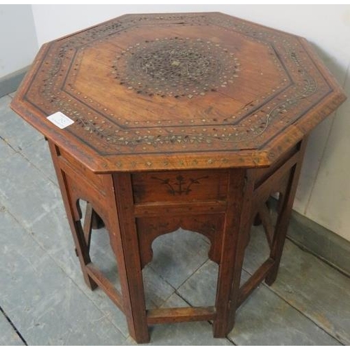 752 - An early 20th century Anglo Indian teak octagonal table, strung with ebony and boxwood and featuring... 