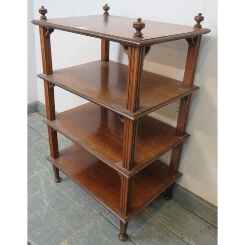 754 - An Edwardian mahogany freestanding four-tier whatnot of small proportions, having turned finials and... 