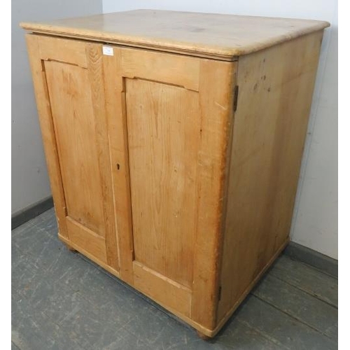 758 - An antique stripped pine pantry cupboard, housing four pull out slides, on bun feet. 
H103 W88 D65
C... 