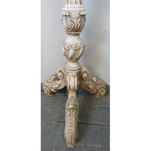 769 - An ornate vintage standard lamp in the Florentine taste painted white, the fluted column on acanthus... 