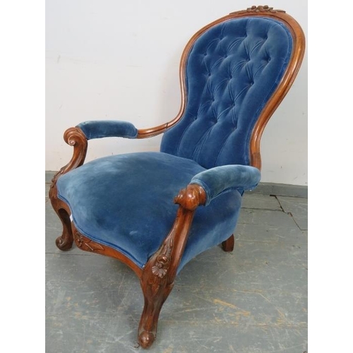 774 - A Victorian walnut spoonback open-sided armchair, upholstered in buttoned royal blue velvet material... 