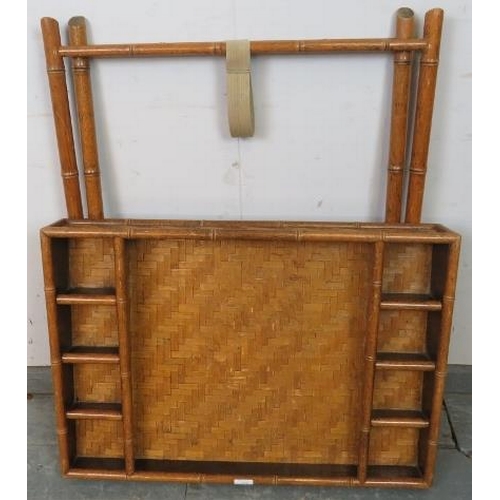 777 - A vintage faux bamboo butler’s tray on stand, having divided internal compartments and parquetry sty... 