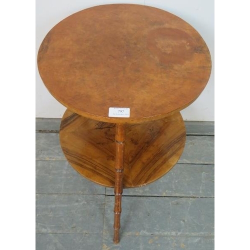 797 - A vintage walnut circular two-tier table, on canted faux bamboo tripod supports. 
H63 Diameter 44
Co... 