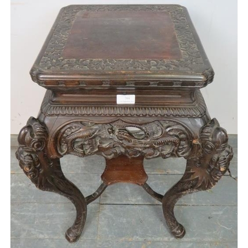 799 - An antique Chinese hardwood plant stand with ornately carved and pierced frieze, on carved cabriole ... 