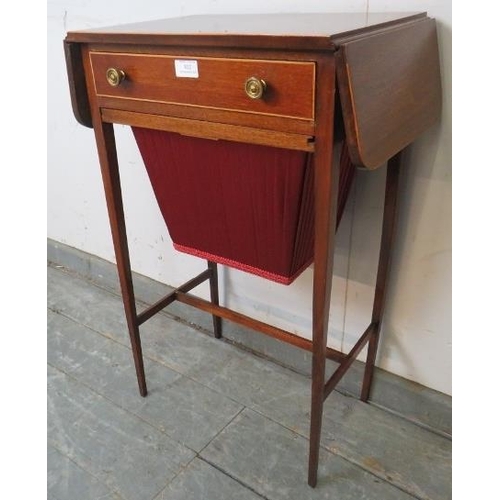 812 - An Edwardian mahogany drop-leaf worktable, strung with satinwood, housing one long drawer with press... 