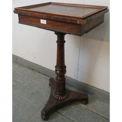 814 - A William IV rosewood games table, the top with hidden release catch opening onto a storage compartm... 