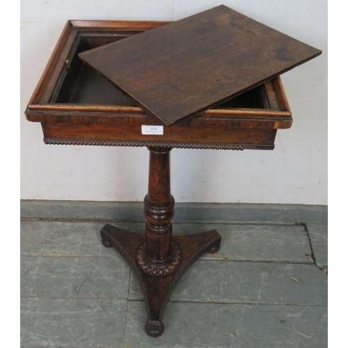 814 - A William IV rosewood games table, the top with hidden release catch opening onto a storage compartm... 