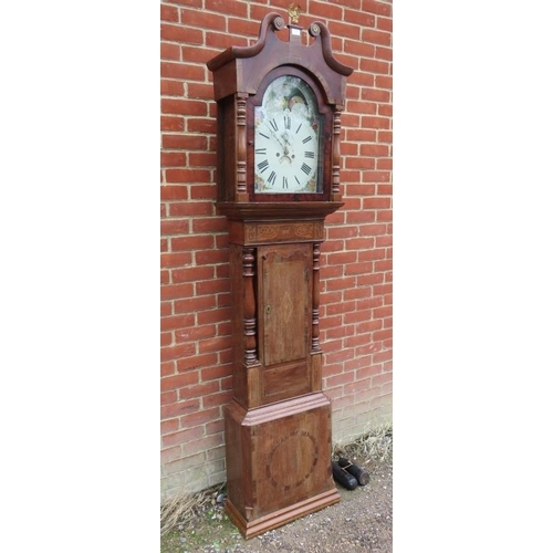 831 - A Regency Period mahogany and oak cased 8-day striking longcase clock, the hood with swan-neck pedim... 