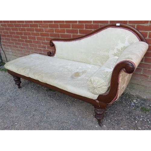 835 - A Victorian mahogany chaise longue with scrolled back, upholstered in cream damask material with mat... 