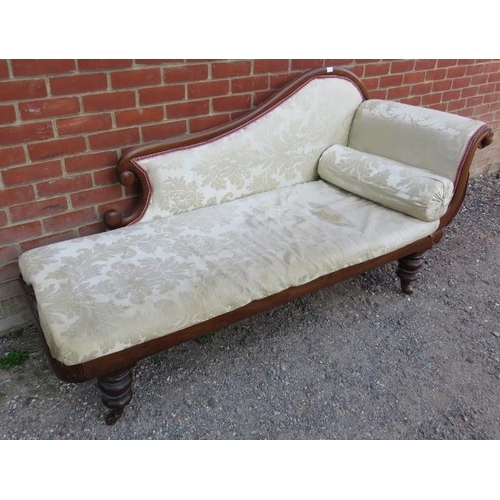 835 - A Victorian mahogany chaise longue with scrolled back, upholstered in cream damask material with mat... 