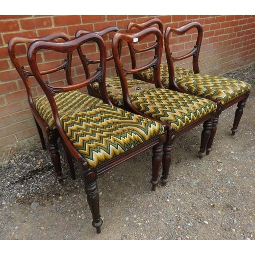 848 - A set of six Victorian walnut balloon back dining chairs, on tapering reeded supports.
H83 W46 D50
C... 