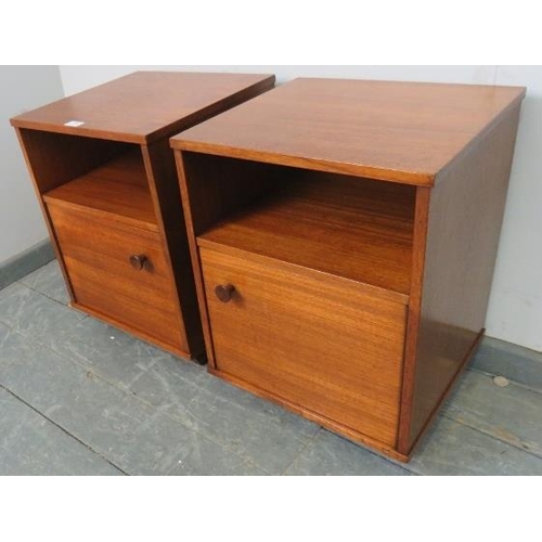 849 - A pair of mid-century teak bedside cabinets by Avalon, with open shelves above cupboards with turned... 