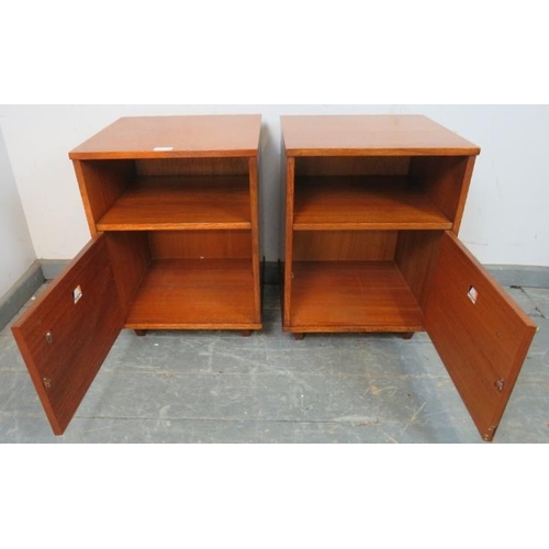 849 - A pair of mid-century teak bedside cabinets by Avalon, with open shelves above cupboards with turned... 