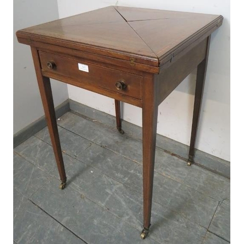 867 - An Edwardian mahogany envelope card table, crossbanded and strung with boxwood and ebony, housing on... 