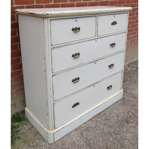 868 - A 19th century pitch pine chest, painted cream and distressed, housing two short over three long gra... 