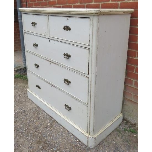 868 - A 19th century pitch pine chest, painted cream and distressed, housing two short over three long gra... 