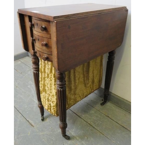 871 - A William IV mahogany drop-leaf worktable, housing two short drawers with tapestry storage well unde... 