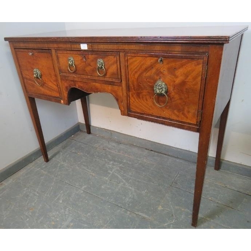 876 - A Georgian flame mahogany sideboard of small proportions, with reeded edge, housing two drawers and ... 