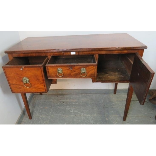 876 - A Georgian flame mahogany sideboard of small proportions, with reeded edge, housing two drawers and ... 