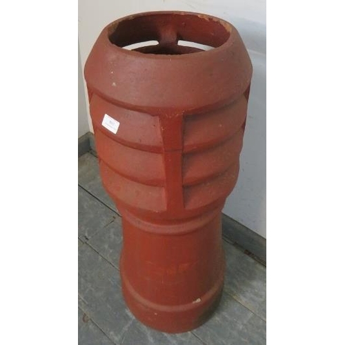 883 - A terracotta chimney pot/plant stand with vented cowl.
H78 W32
Condition report: Some minor losses t... 