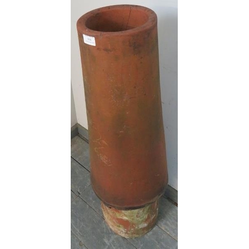 884 - A vintage terracotta vortex chimney pot/plant stand. 
H98 Diameter 33
Condition report: Crack to one... 