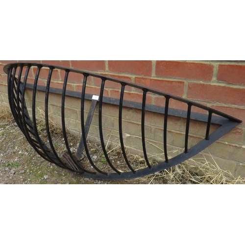 900 - A vintage wrought iron wall-mounting manger/planter, with mounting brackets.
H34cm W128cm D41cm (app... 