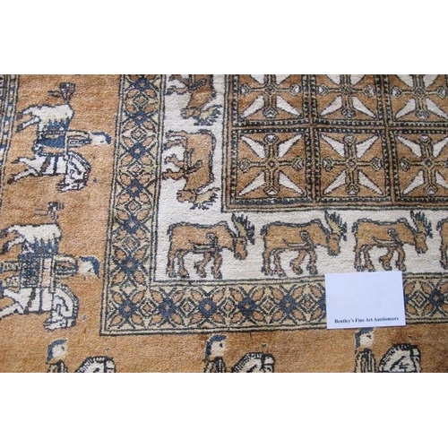 915 - An Afghan rug depicting figures on horseback, moose and wild cats, all on a tan field. 200cm x 119cm... 