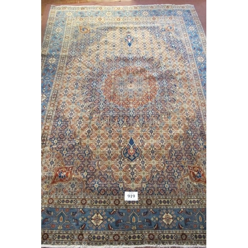 919 - A fine Persian Mood carpet central medallion on tan, blue and orange ground and in good clean condit... 