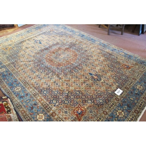 919 - A fine Persian Mood carpet central medallion on tan, blue and orange ground and in good clean condit... 