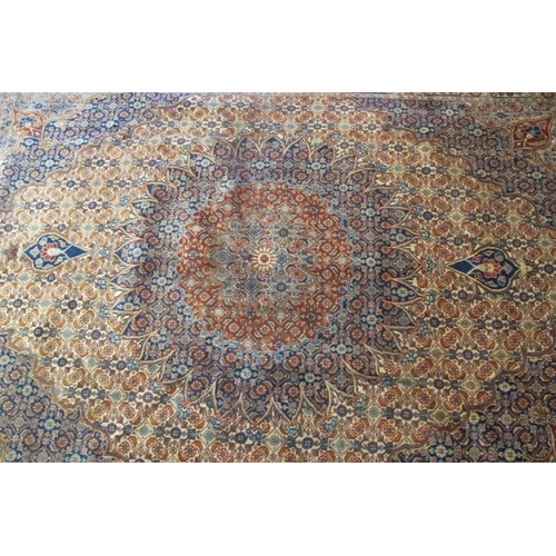 919 - A fine Persian Mood carpet central medallion on tan, blue and orange ground and in good clean condit... 