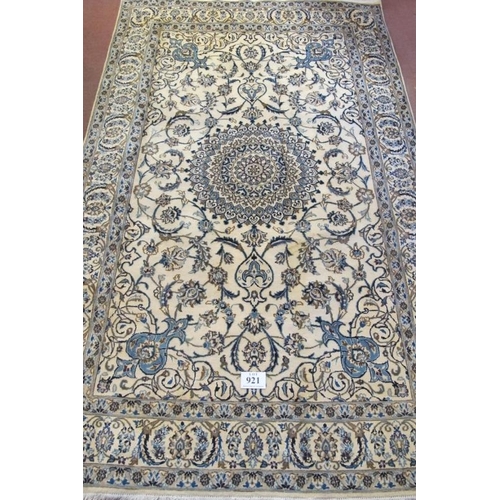 921 - A good Persian fine Nain carpet central round motif blue on cream ground. In very good condition. 31... 