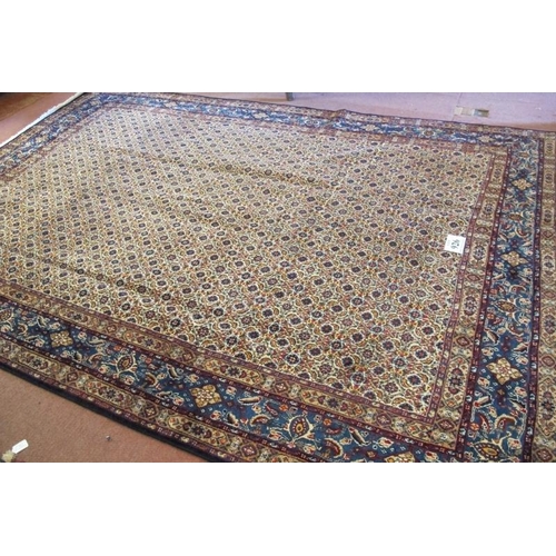 926 - A lovely Persian Mood carpet. Central block repeat pattern design, blue, red, brown and in very good... 