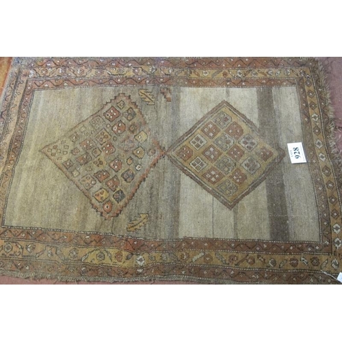 928 - An early-mid 20th century Persian rug, diamond motifs to centre with 3 leaves - edges worn, colour f... 