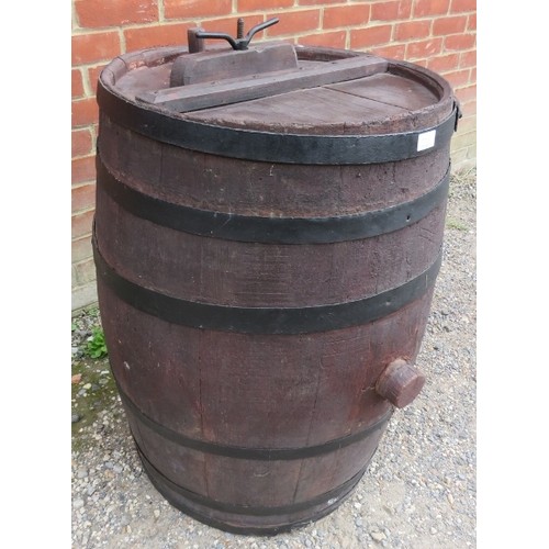 891A - A 19th century Italian oak coopered wine barrel, with cast iron fittings and original stoppers.
H83 ... 