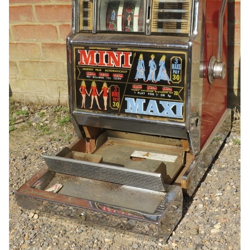 710A - A vintage Jubilee 'Riviera' chromed one-armed bandit penny slot machine. Includes vintage coins. 
H7... 