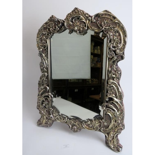 A fine large William Comyns silver easel dressing table mirror, London