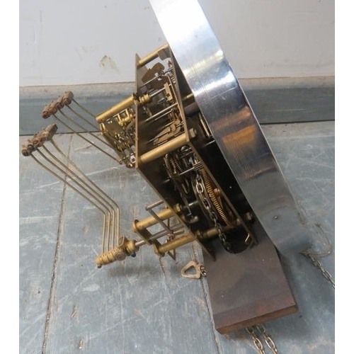 725 - An Art Deco Period oak cased Westminster chiming longcase clock, having a three weight driven moveme... 