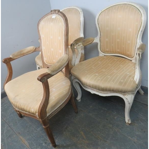 748 - A pair of antique French open-sided armchairs in the Louis XV taste, painted white and distressed, u... 