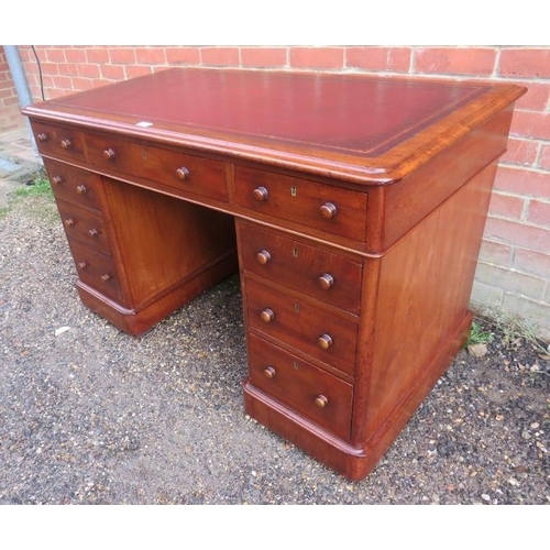 834 - A Victorian mahogany pedestal desk, having inset gilt tooled burgundy leather writing surface, housi... 