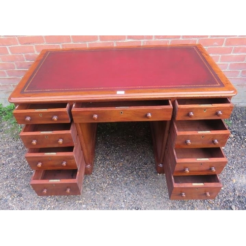 834 - A Victorian mahogany pedestal desk, having inset gilt tooled burgundy leather writing surface, housi... 