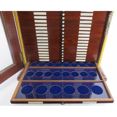 A mahogany coin collection display late 19th/early 20th