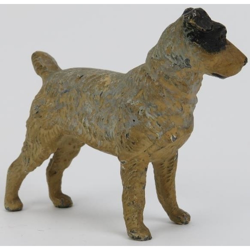 100 - A cold painted spelter model of a terrier dog, early 20th century. 8.3 cm length. 
Condition report:... 