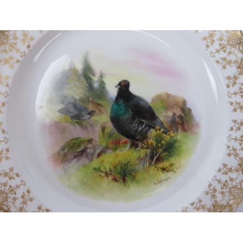 102 - A set of six Royal Worcester porcelain game bird plates decorated by George Johnson, dated 1901. Eac... 