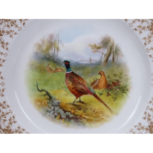 102 - A set of six Royal Worcester porcelain game bird plates decorated by George Johnson, dated 1901. Eac... 