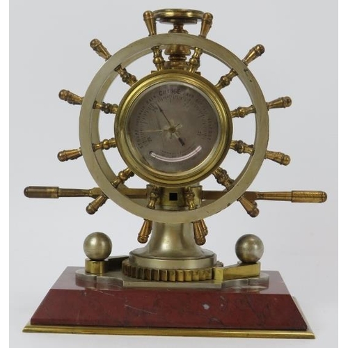 109 - A French ship’s helm marine presentation clock, Paris, 19th century. Modelled as a twelve spoke doub... 